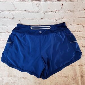 Athleta Run With It Medium Shorts Blue Shorts Liner Rear Pocket Running Training